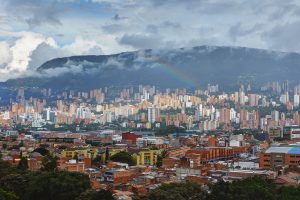 Picture of Medellin Colombia with a rainbow